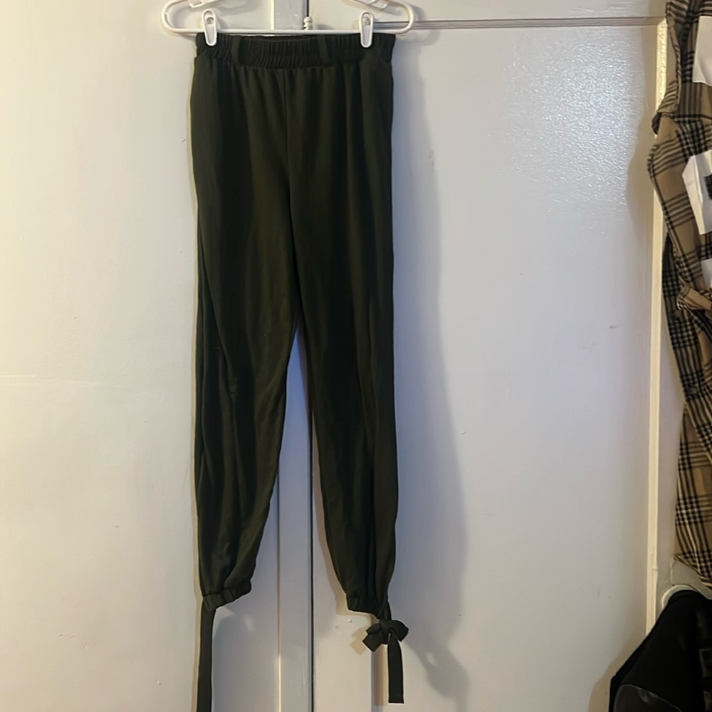 Green sweatpants